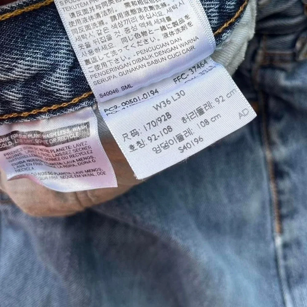 Levi's 501 blue jeans distressed